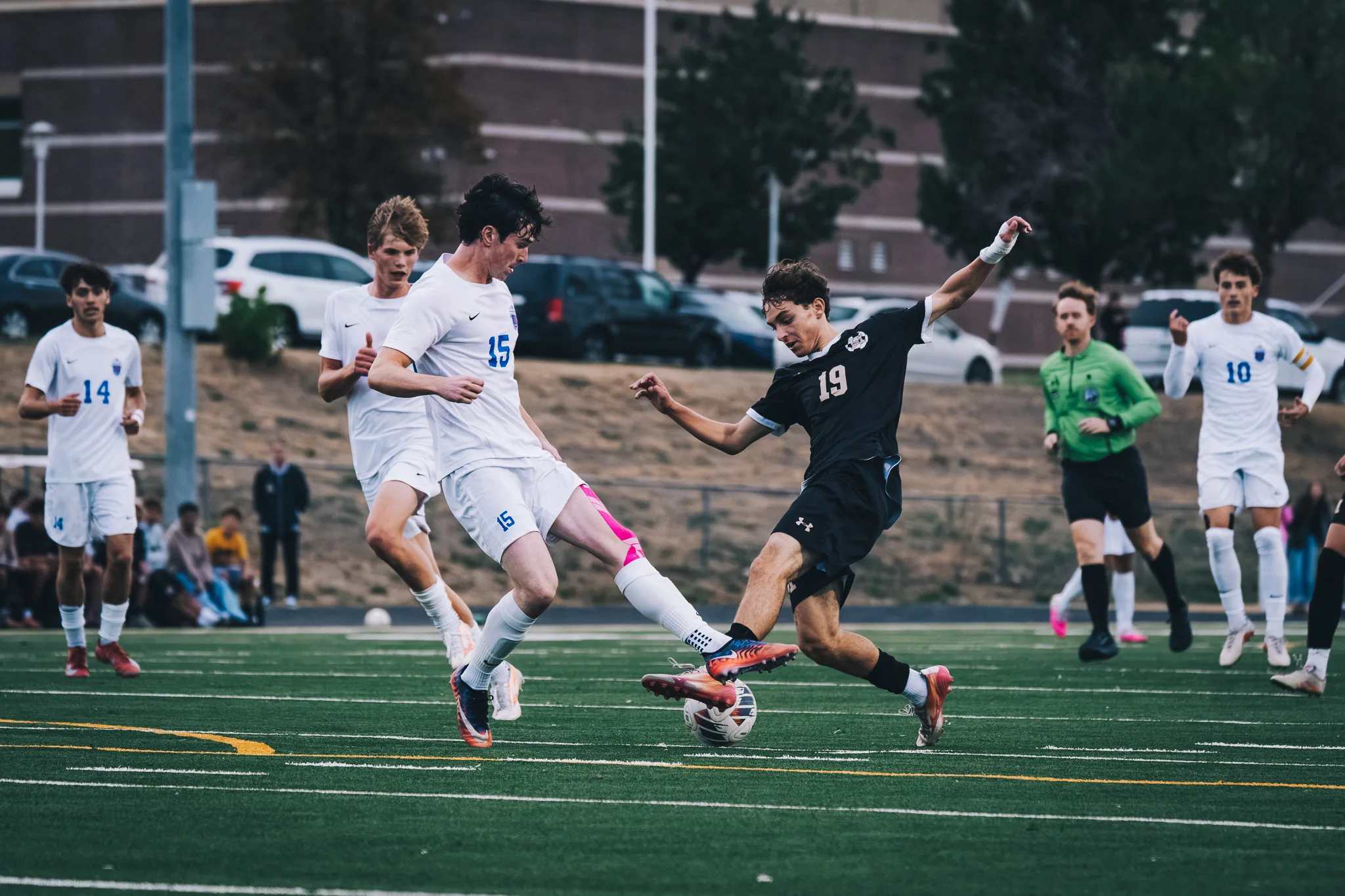 Centaurus number 15 and Monarch number 19 reach for the ball at the same moment