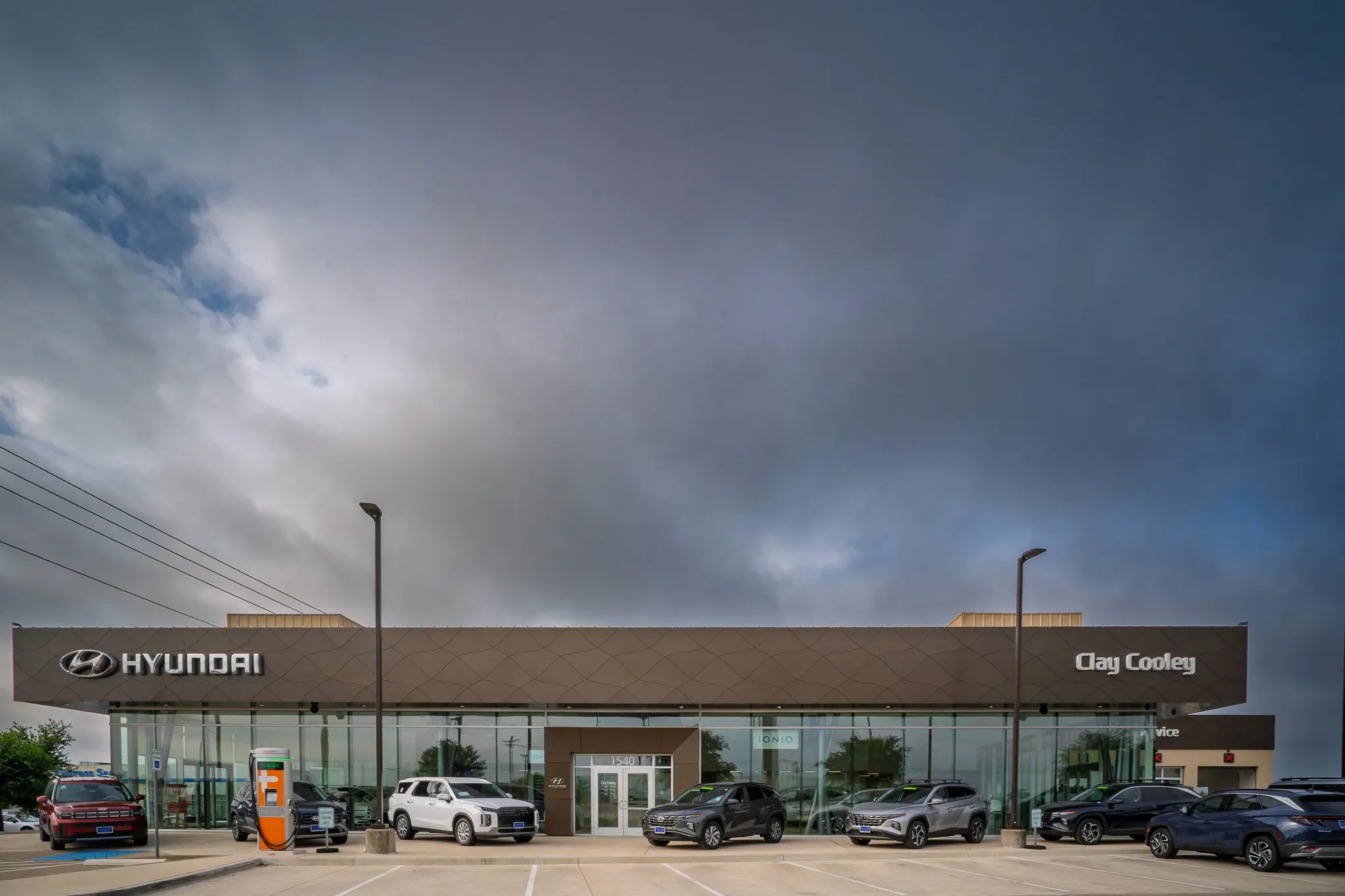 Front elevation of Clay Cooley Hyundai of Rockwall in Rockwall, Texas, under a stormy sky, built by The Charles Morgan Group