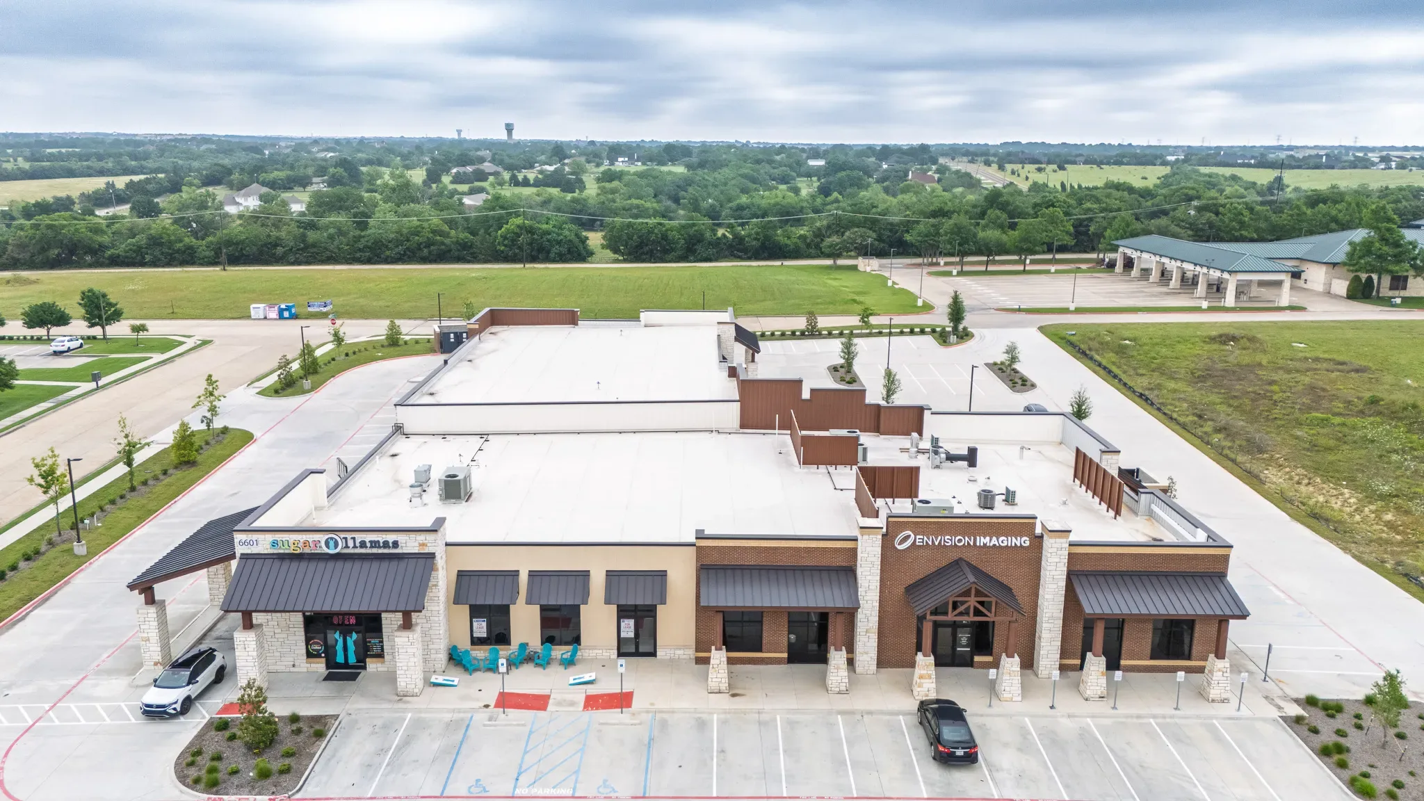 Aerial view of Alliance Shopping Center at 6601 Horizon Road in Rockwall, Texas, anchored by Envision Imaging, built by The Charles Morgan Group